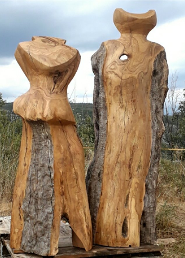 two olive wood sculptures
